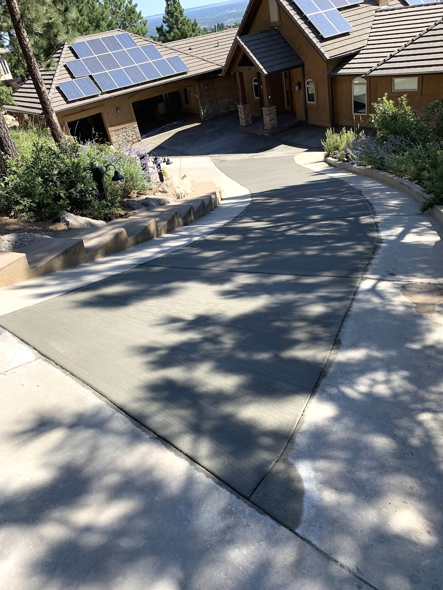 Concrete driveway panels at a mountain home near Colorado Springs.
